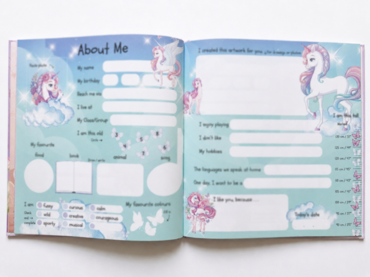 Open Flying with Unicorns friendship book showing About Me pages with unicorns, clouds, butterflies and spaces for children to fill in.